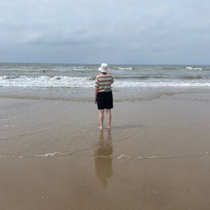 A woman looking at the sea